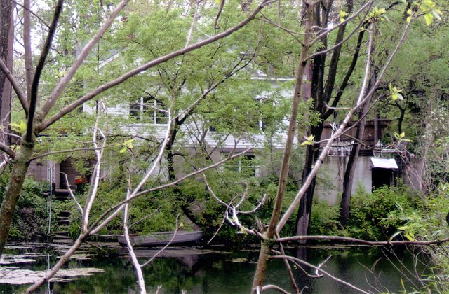 The Borkland House, from across the lake and former quarry