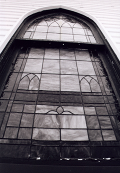 Stained glass in a building designed by Samuel Plato