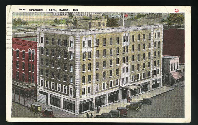 (ca. 1926) Color postcard of Spencer Hotel, shows vintage autos parked on the street. Postmarked August 26, 1926