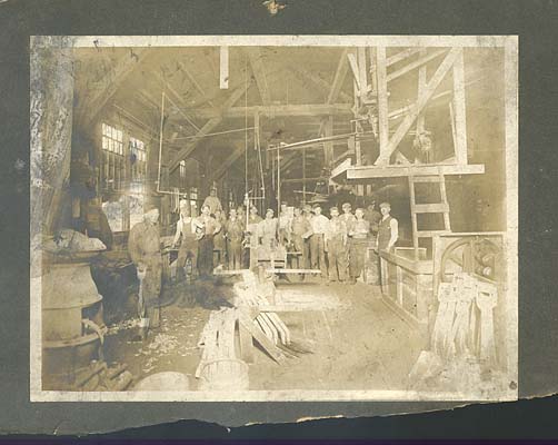 Employees and equipment inside Canton Glass. Date Unknown